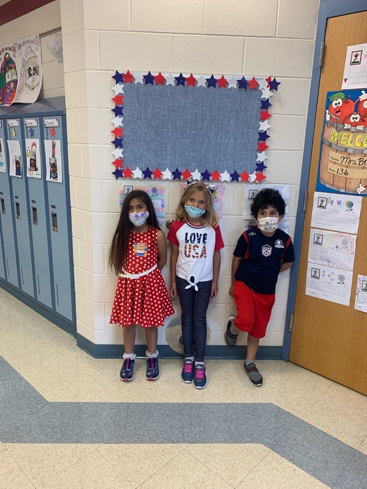 Columbus Manor first graders celebrating Patriot Day